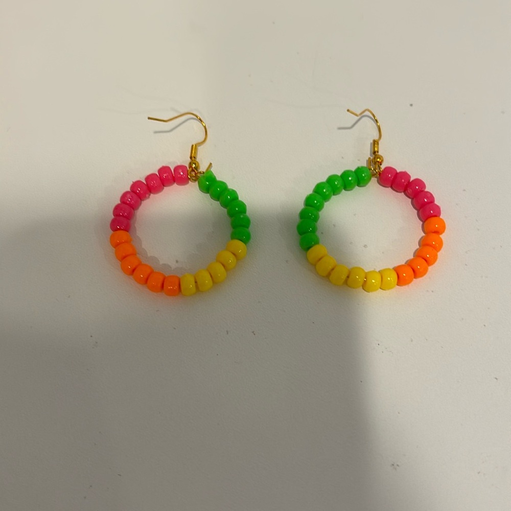 Pink, yellow, green, and orange hoop earrings